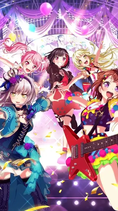 Five girls in vibrant outfits on stage with electric guitars
