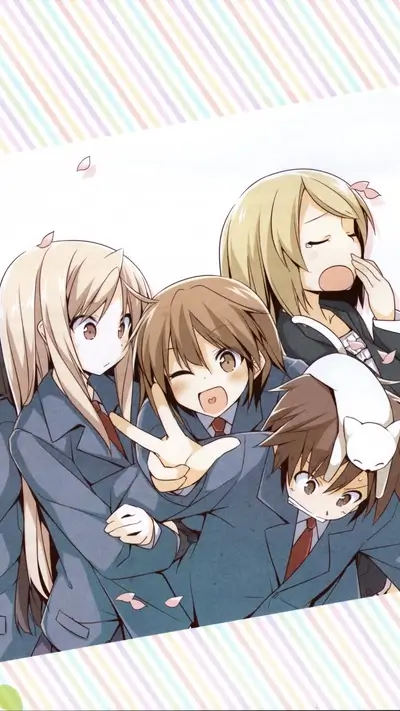 Four girls in school uniforms huddled together