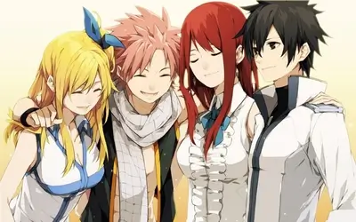 Four happy friends standing together and smiling cheerfully
