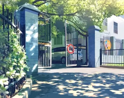 Gate to a building with a no parking sign