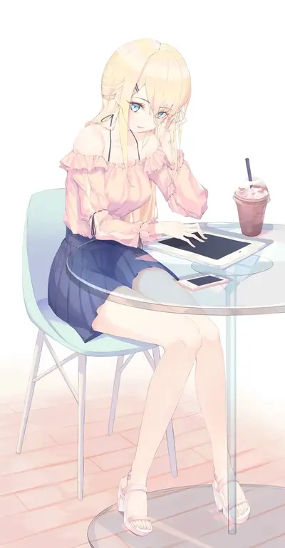 Girl at cafe using a tablet