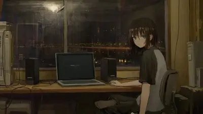 Girl at night using laptop