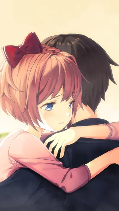 Girl crying while hugging a person, sadness in expression