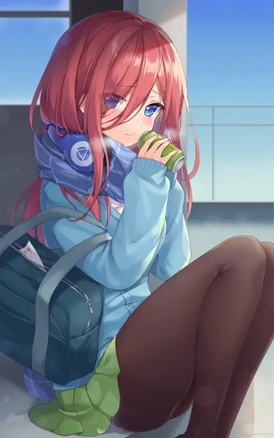Girl enjoying a drink with headphones and bag