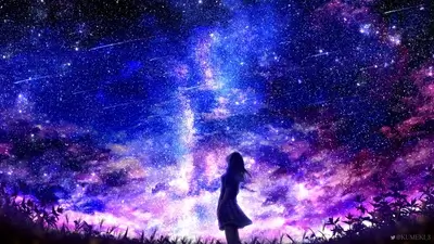 Girl gazing at a vibrant night sky