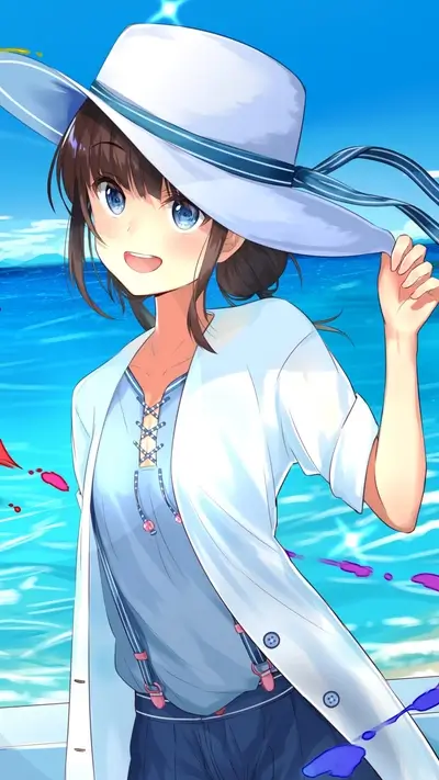 Girl in a sun hat at the beach