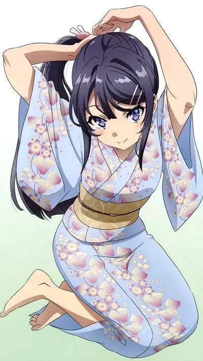 Girl in a yukata tying her hair