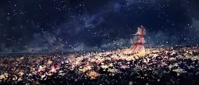 Girl in glowing field under starry night