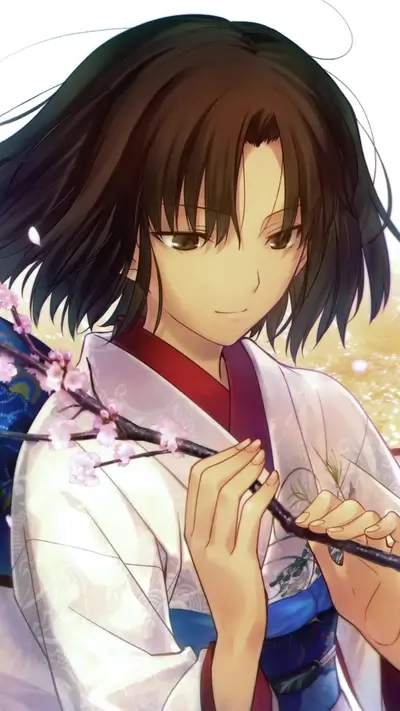 Girl in kimono holding a branch of cherry blossoms