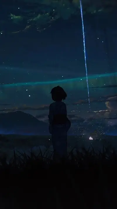 Girl in kimono looking at meteor in the night sky
