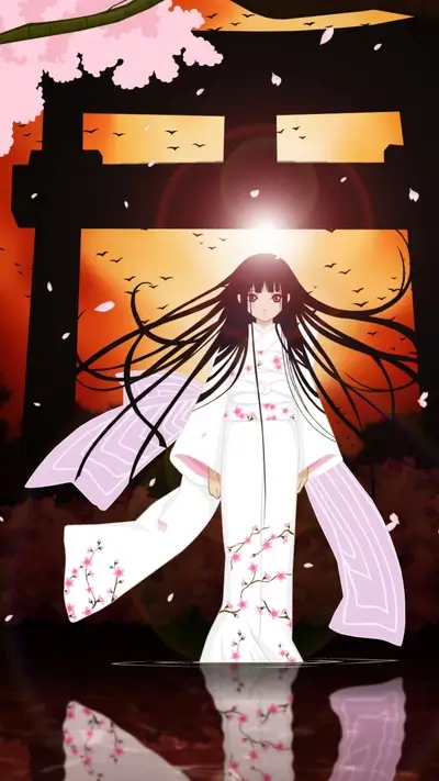 Girl in kimono standing in front of a torii gate