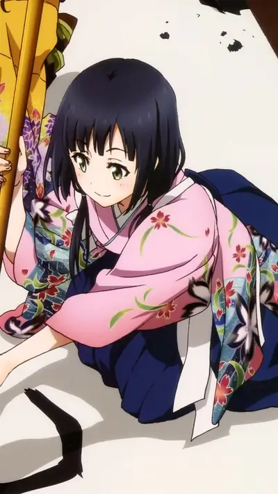 Girl in pink kimono holding a stick