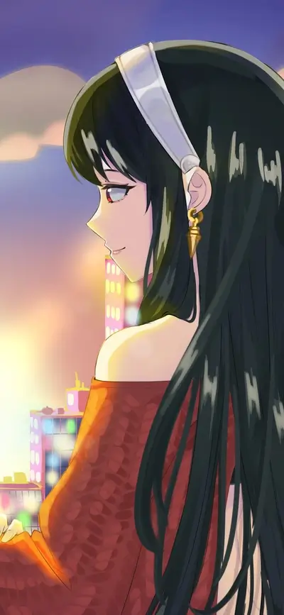 Girl in red dress looking at city sunset