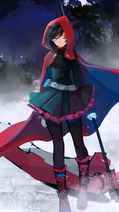 Girl in red hood standing in snow