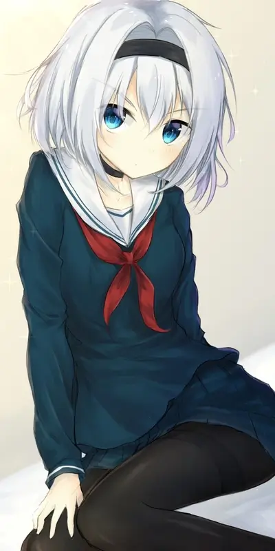 Girl in sailor uniform sitting