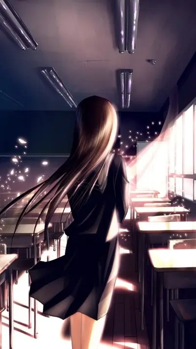 Girl in school classroom, sunlight streaming in
