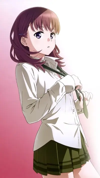 Girl in school uniform adjusting tie