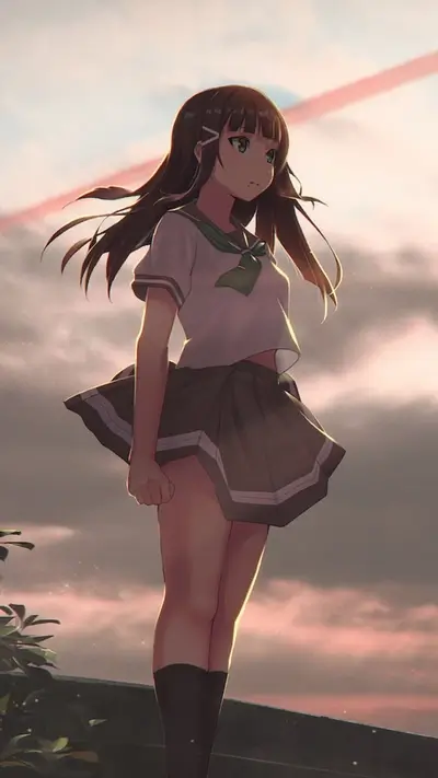 Girl in school uniform looking at the sky
