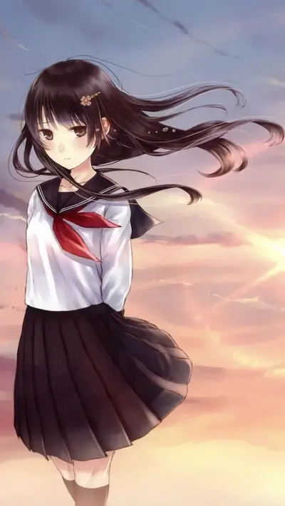 Girl in school uniform with hair flowing in wind, sunset in background