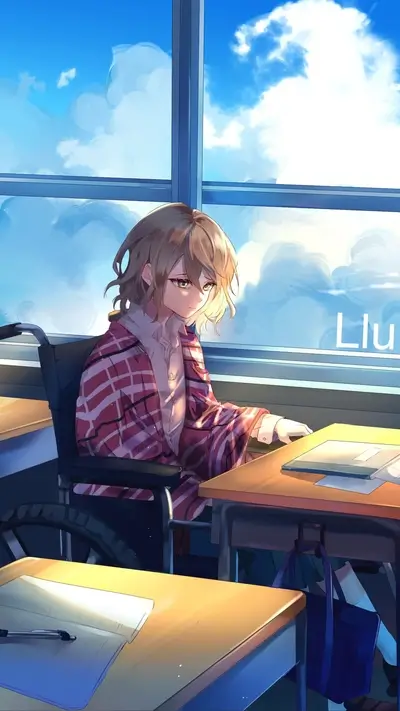 Girl in wheelchair studying by window
