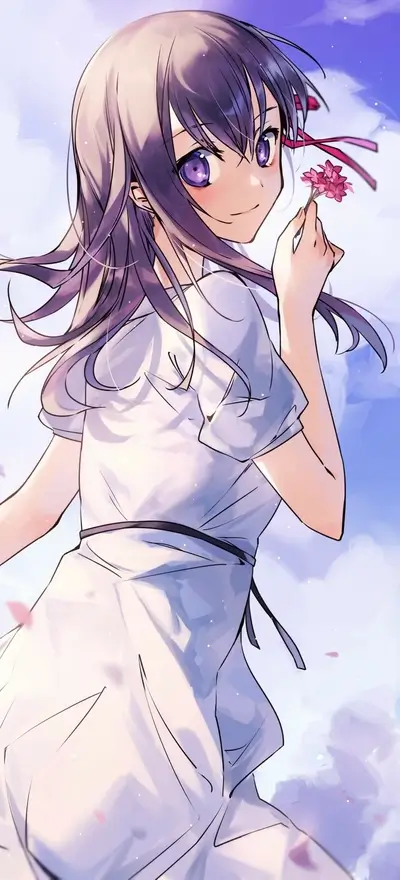 Girl in white dress holding flowers