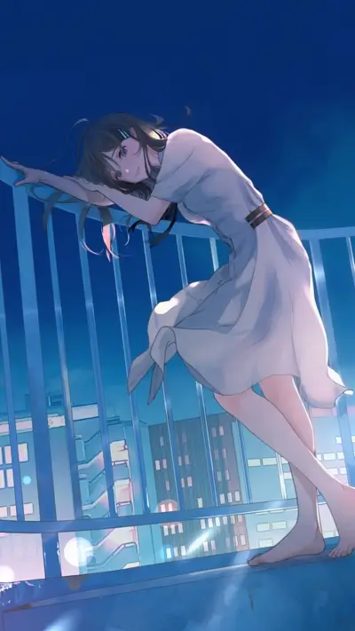 Girl in white dress on a balcony at night