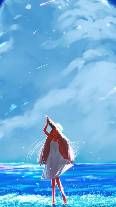 Girl in white dress on beach under a blue sky