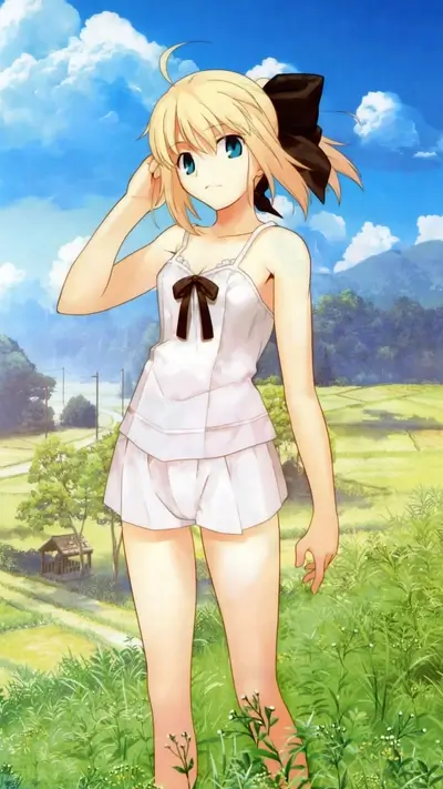 Girl in white summer clothes standing in a field