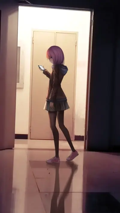 Girl is standing in the doorway, looking at her smartphone