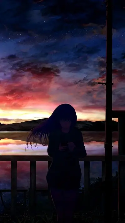 Girl on a bridge at sunset