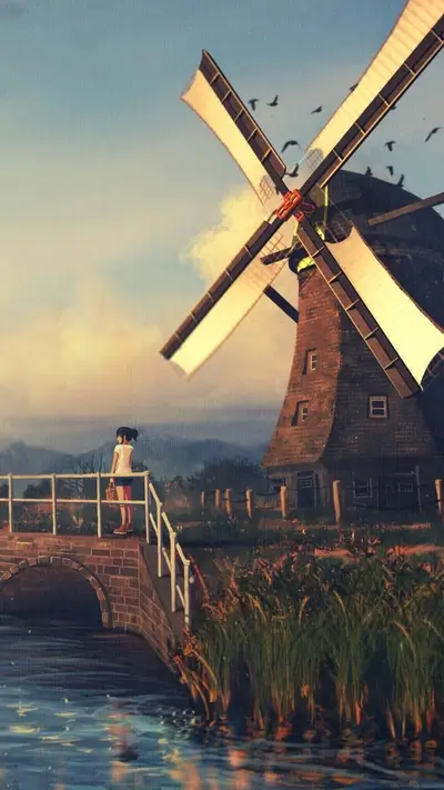 Girl on bridge admires windmill, birds flying overhead in a scenic landscape