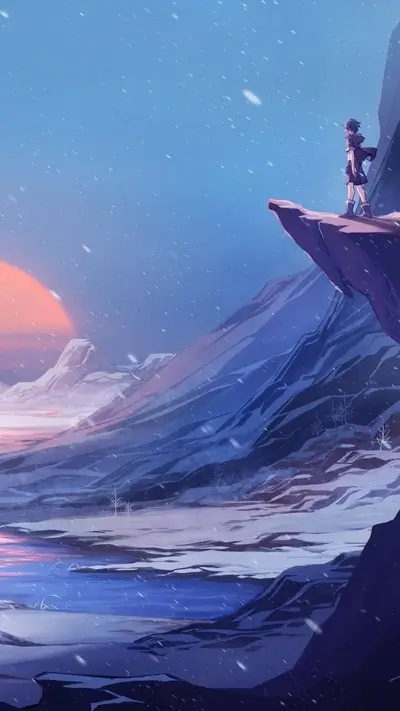 Girl on cliff overlooking snowy mountains at sunset