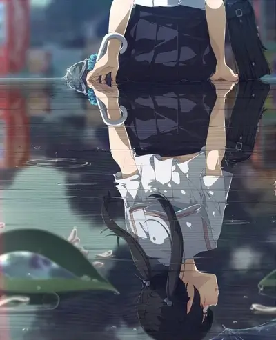 Girl reflected in puddle, holding umbrella