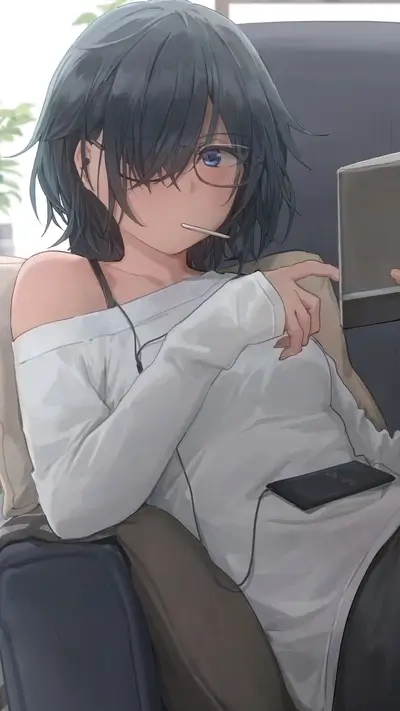 Girl relaxing on a couch listening to music