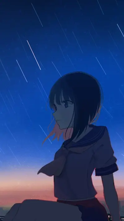 Girl sits and looks at the night sky