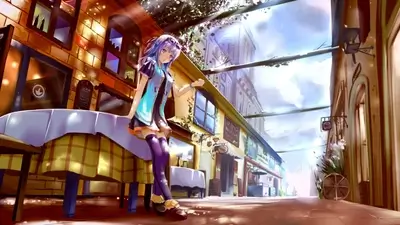 Girl sitting at a cafe table in a sunny European-style street