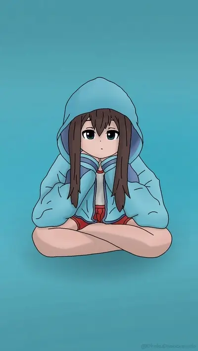 Girl sitting cross-legged in a blue hoodie