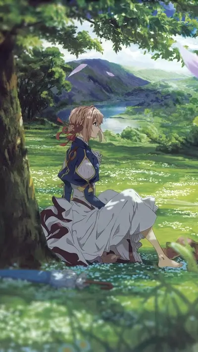 Girl sitting in a field near a river