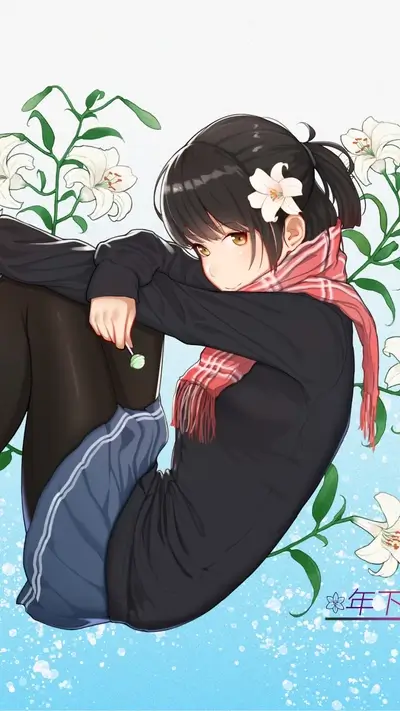 Girl sitting in winter clothes surrounded by lilies