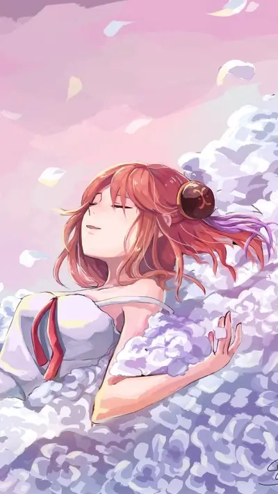 Girl sleeping in a field of flowers