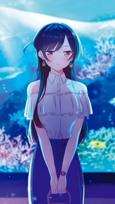 Girl standing in front of an aquarium