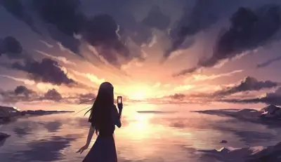 Girl taking a photo of sunset over calm water