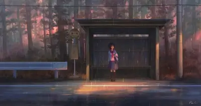 Girl waiting at a bus stop in the rain
