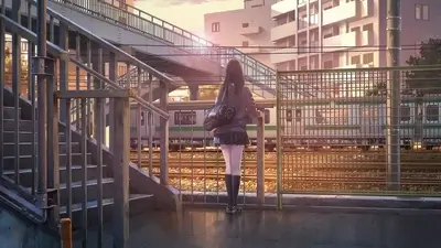 Girl waits at a train station