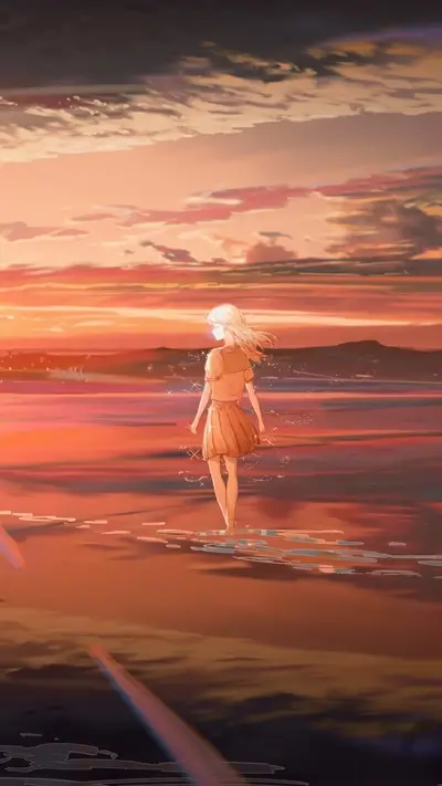 Girl walking on beach at sunset
