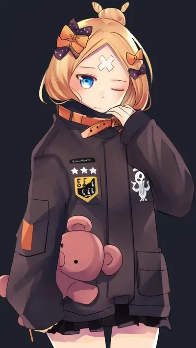 Girl with blond hair and orange bows