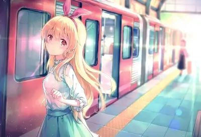 Girl with blonde hair at train station