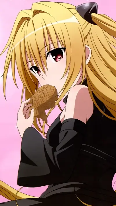 Girl with blonde hair eating Taiyaki