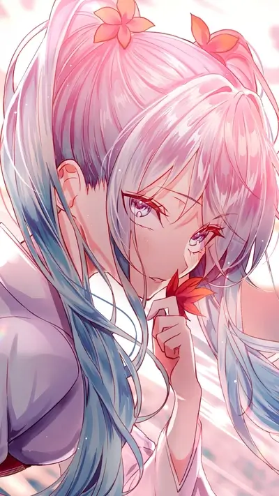 Girl with blue and pink hair holding a red maple leaf