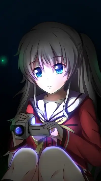 Girl with blue eyes holding a camcorder